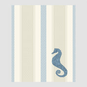 Part of the Coastal Collection, the Seahorse Square Throw Blanket by in2green features vertical beige and blue stripes with a charming blue seahorse design on the lower right side.